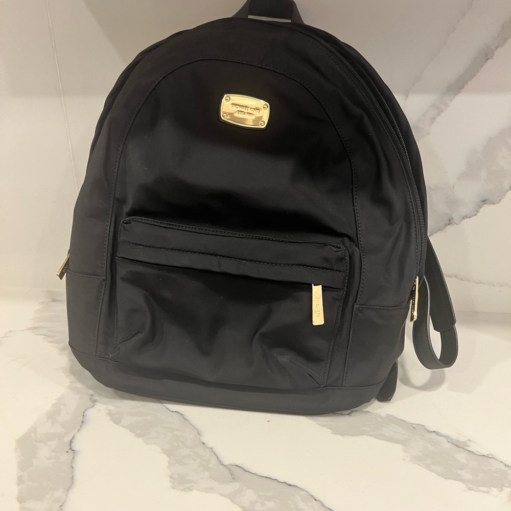 Michael Kors Black Backpack with Gold Details